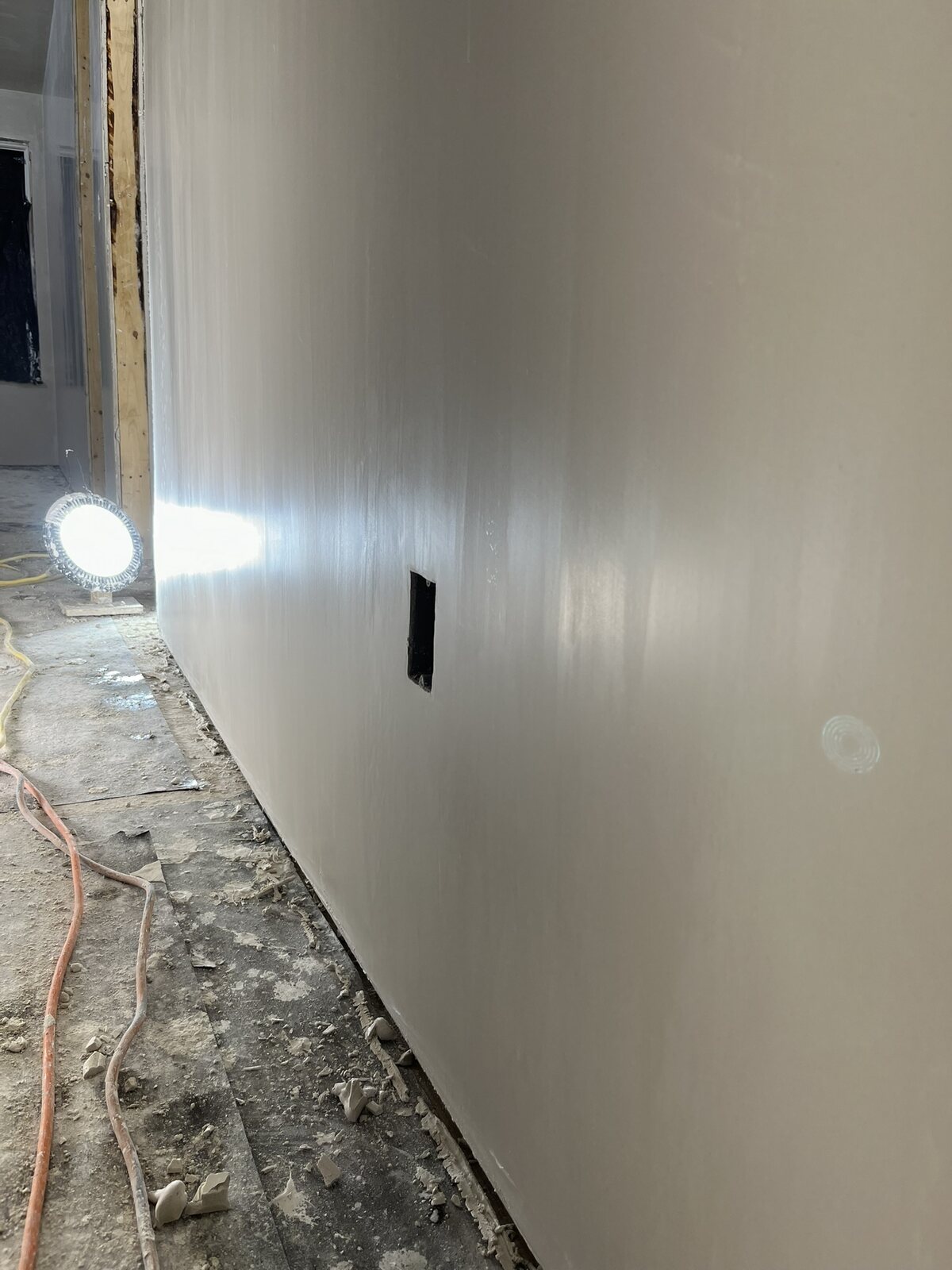 Light custom decorative plaster finish with a subtle polished texture