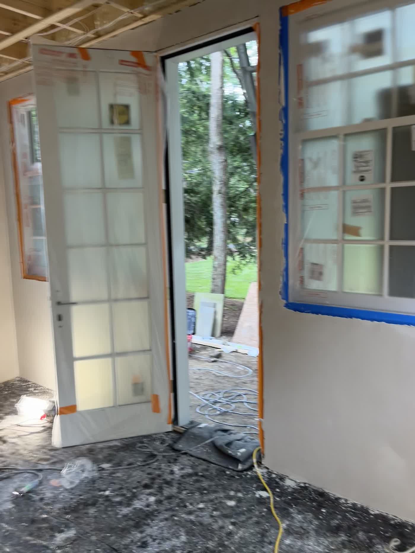 Veneer plaster application in progress